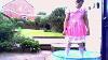 Sissy Baby Playing In Paddling Pool In Nappy And Dress